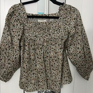 Cream and brown puff sleeve blouse with smocked detail and 3/4 sleeves